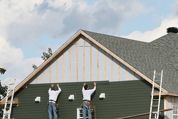 Professional Siding Installation technician working in Hampton, IL